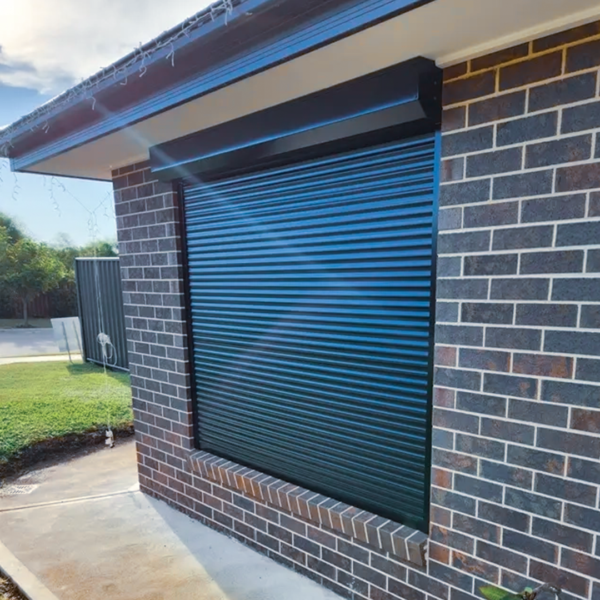 Professional installation of robust commercial roller shutters, providing optimal security for business premises.