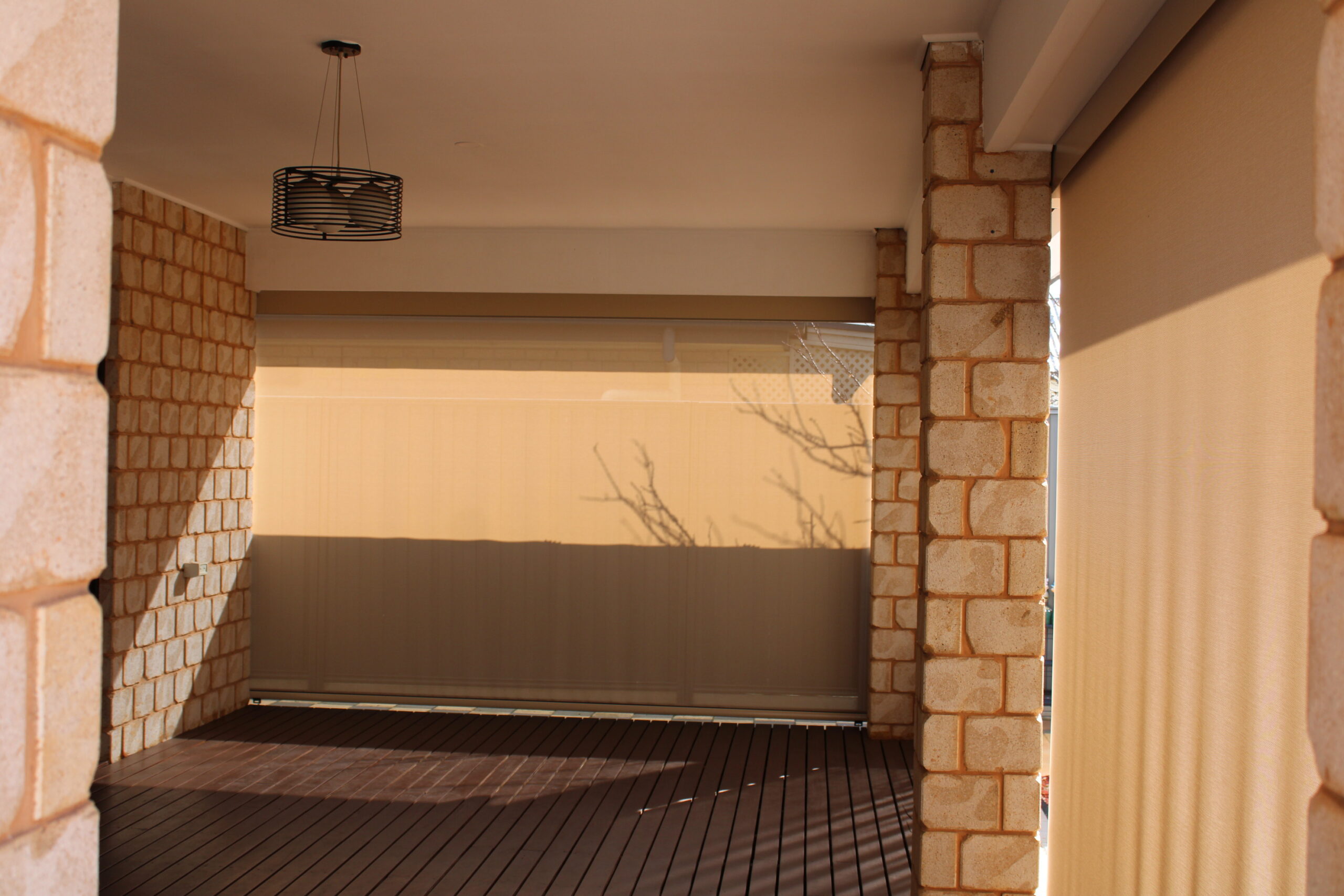 Different styles and colors of Outdoor Blinds for versatile applications.